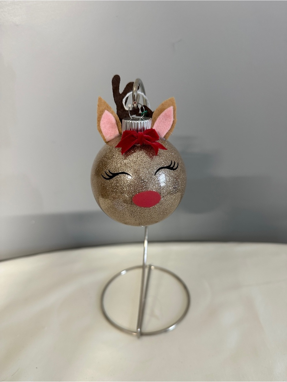 Festive Gold Reindeer Ornament with Red Accents - Holiday Home Decor